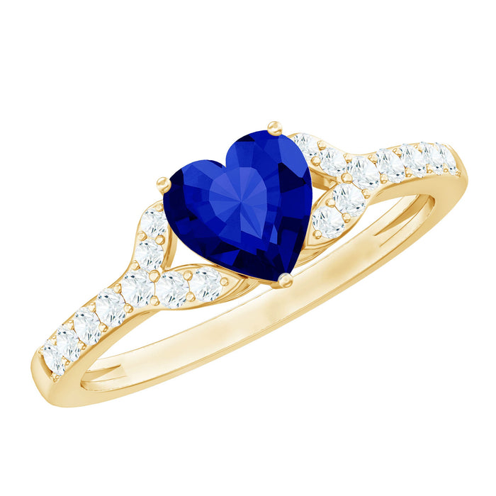 Rosec Jewels 0.9 carat lab-grown blue sapphire heart engagement ring with real diamond accents, showcasing intricate detail and elegant design.