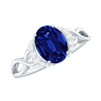 Certified 1.5 Carat Lab Grown Blue Sapphire Diamond Oval Engagement Ring with Crossover Shank
