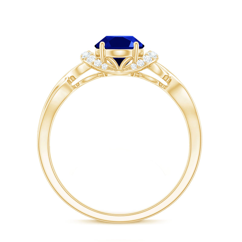 Rosec Jewels 1.5 carat lab-grown blue sapphire diamond oval engagement ring with crossover shank and intricate detailing.