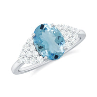 Solitaire 1 Carat aquamarine oval engagement ring with diamond cluster setting by Rosec Jewels, showcasing elegant jewelry design.