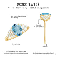 Rosec Jewels solitaire 1 carat aquamarine oval engagement ring with diamond cluster setting, featuring a silver band and intricate design.