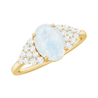 Oval cut moonstone solitaire ring with diamond accent by Rosec Jewels, showcasing the elegant gemstone setting and band details.