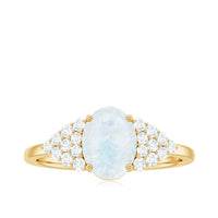 Oval cut moonstone solitaire ring with diamond accent from Rosec Jewels, showcasing the elegant gemstone and delicate band.