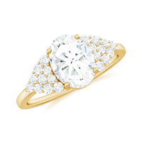 Oval moissanite engagement ring with cluster side stones, set in a Rosec Jewels ring showcasing sparkling gemstone detail.