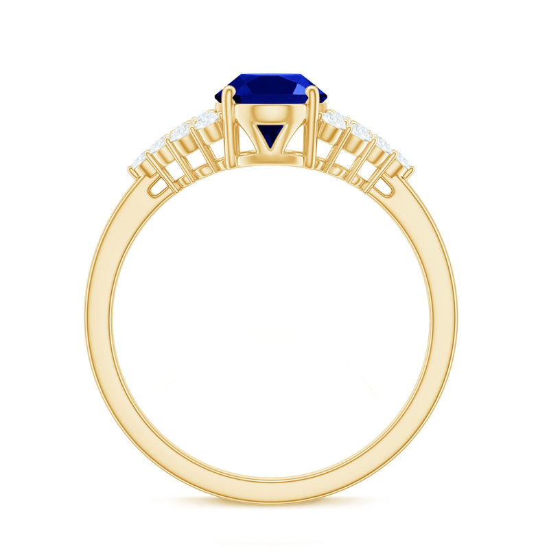 Rosec Jewels 1.5 Carat lab-grown blue sapphire oval engagement ring with diamond side stones, showcasing elegant jewelry design.