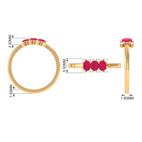 Oval ruby three-stone promise ring with diamond accents from Rosec Jewels, featuring sparkling stones and a polished band.