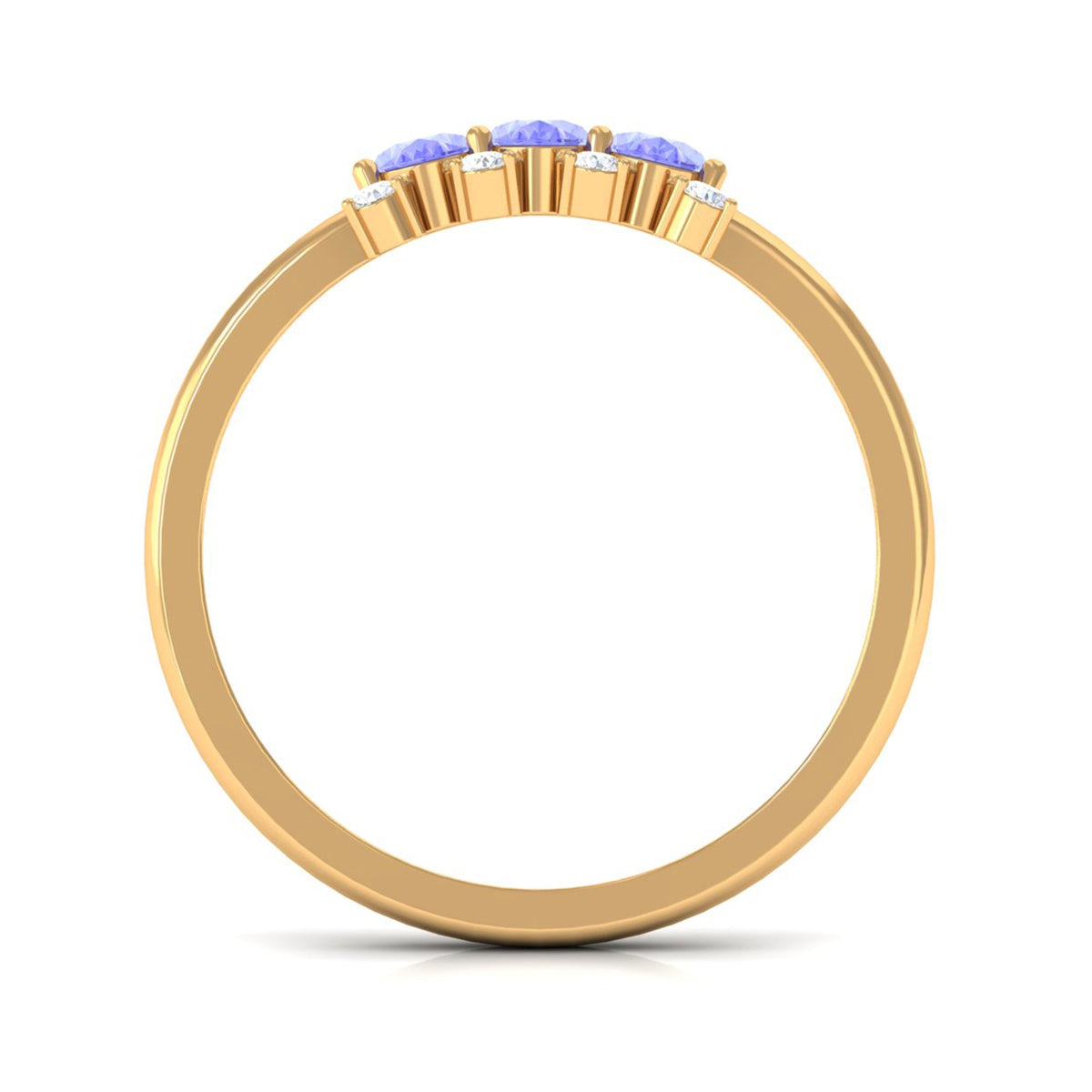 Oval cut Tanzanite three stone ring with diamonds by Rosec Jewels, showcasing the elegant gemstone and sparkling diamond accents.