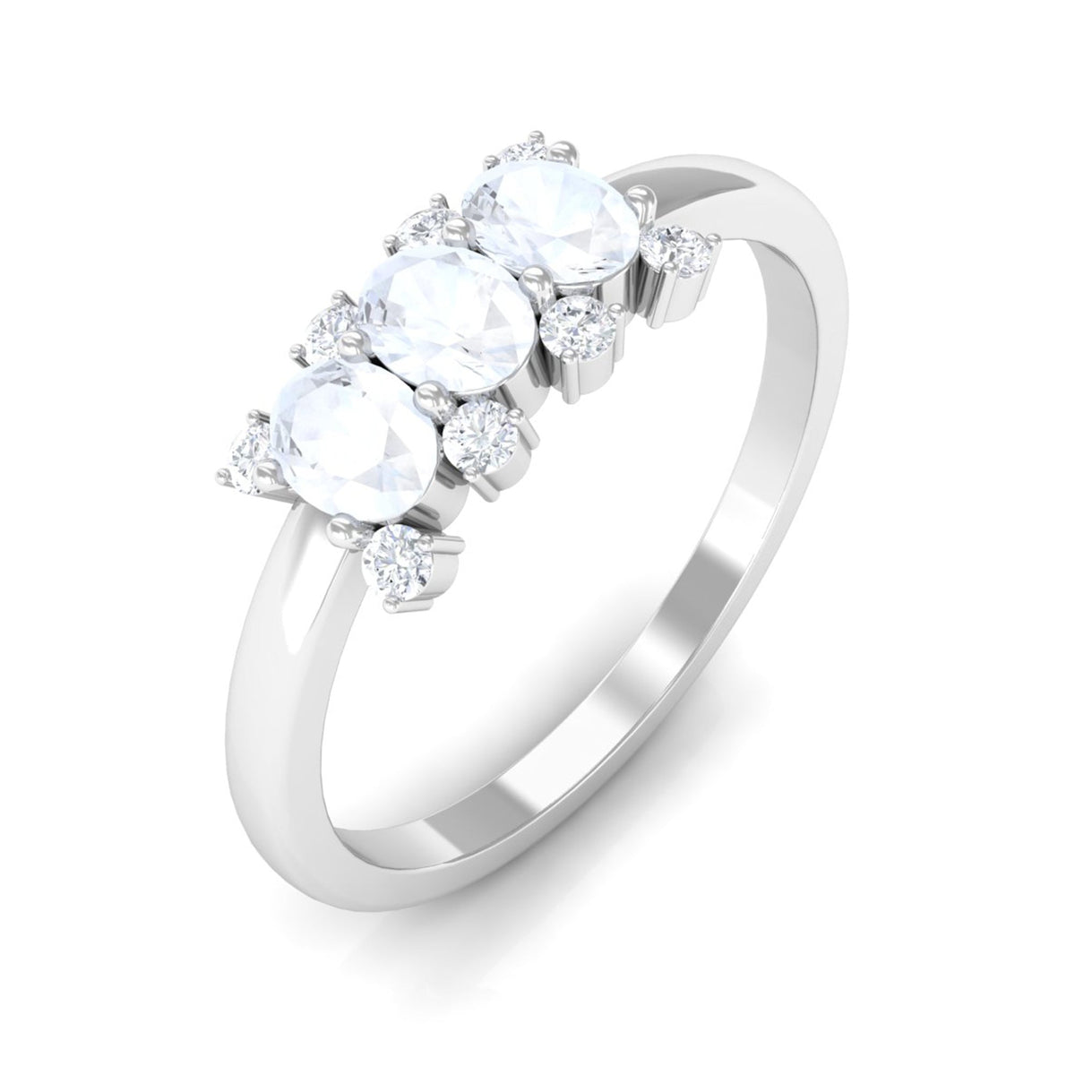 Oval cut moonstone three stone ring with diamond accents, crafted by Rosec Jewels, showcasing a elegant and sparkling jewelry piece.