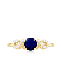 Real 0.9 Carat blue sapphire infinity promise ring with diamond from Rosec Jewels, showcasing the elegant ring design and sparkling stones.