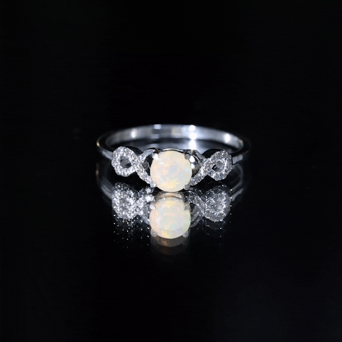 Certified Ethiopian Rainbow Opal diamond engagement ring with criss-cross shank in yellow gold from Rosec Jewels.