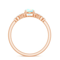 Certified Ethiopian Rainbow Opal diamond engagement ring with criss-cross shank, featuring vibrant rainbow-colored opal and sparkling diamonds.