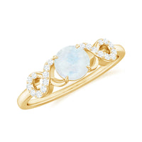 Natural moonstone solitaire ring with criss-cross diamond accents by Rosec Jewels, showcasing a 3/4 carat moonstone in a sleek design.