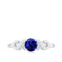 Certified 0.6 Carat Lab Grown Blue Sapphire Engagement Ring with Diamond Infinity Knot
