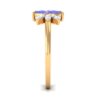 Marquise cut tanzanite and diamond promise ring by Rosec Jewels featuring a central tanzanite gemstone with surrounding diamonds.
