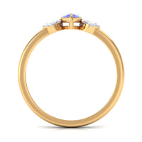 Marquise cut Tanzanite and diamond promise ring by Rosec Jewels, featuring a 1 carat center stone and delicate band design.