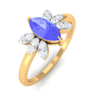 Marquise cut tanzanite and diamond promise ring by Rosec Jewels, showcasing a stunning 1-carat gemstone set in elegant ring design.