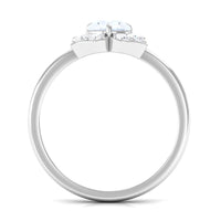 Elegant 1.25 CT moonstone and diamond floral engagement ring from Rosec Jewels, showcasing intricate design and sparkling gemstones.