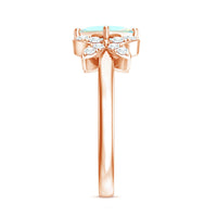 Natural princess cut Ethiopian opal flower engagement ring with diamond accents, featuring a delicate and elegant design by Rosec Jewels.