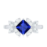 Certified 1.5 Carat Princess Cut Lab Grown Blue Sapphire Engagement Ring with Diamond Flower
