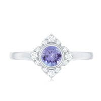 Certified real Tanzanite flower engagement ring with diamond accents, crafted by Rosec Jewels, showcasing a stunning floral design.