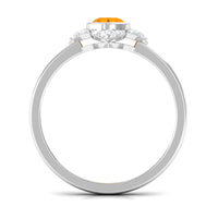 Bezel set orange fire opal flower engagement ring with diamond accents by Rosec Jewels, showcasing intricate design and vibrant gemstone.