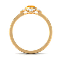 Bezel set orange fire opal flower engagement ring with diamond accents from Rosec Jewels, showcasing intricate floral design.