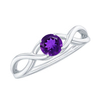 Solitaire amethyst crossover engagement ring by Rosec Jewels featuring a central purple gemstone and elegant band design.