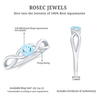 Solitaire aquamarine infinity promise ring by Rosec Jewels featuring a central aquamarine gemstone and infinity symbol band.