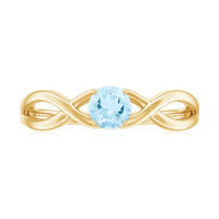 Solitaire aquamarine infinity promise ring by Rosec Jewels with a central aquamarine gemstone and infinity design in sterling silver