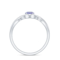Genuine Tanzanite promise ring with crossover shank from Rosec Jewels, showcasing a vibrant blue gemstone and elegant band design.