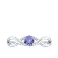 Genuine Tanzanite promise ring with crossover shank by Rosec Jewels, featuring a central blue-violet tanzanite gemstone in a polished band.