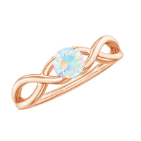 Natural Ethiopian rainbow opal promise ring with crossover shank, crafted by Rosec Jewels, showcasing vibrant colorful gemstones and elegant design.