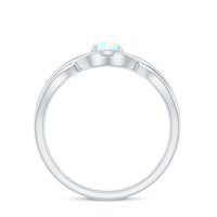 Natural Ethiopian rainbow opal promise ring with crossover shank, crafted by Rosec Jewels, showcasing vibrant colors and elegant design.