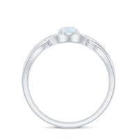 Round moonstone solitaire promise ring with crossover shank, featuring a polished band and a central moonstone gemstone.