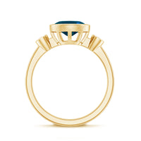 Oval London Blue Topaz Bezel Set Engagement Ring with Diamond