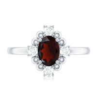 Vintage Inspired 6X8mm Garnet Oval Engagement Ring with Diamond