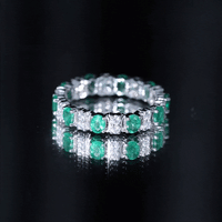 Oval Emerald and Moissanite Eternity Wedding Band