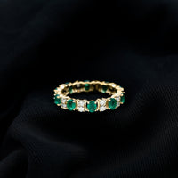 Oval Emerald and Moissanite Eternity Wedding Band