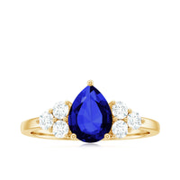 Certified 1.6 Carat Lab Grown Blue Sapphire Pear Engagement Ring with Diamond Trio
