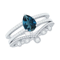 Pear London Blue Topaz Double Band Engagement Ring with Diamond Enhancer