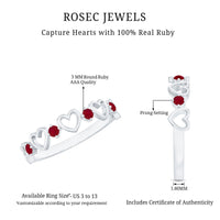 Natural ruby heart eternity ring by Rosec Jewels featuring a continuous row of ruby hearts on a sleek gold band.
