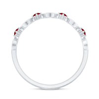 Rosec Jewels natural ruby heart eternity ring featuring a continuous row of vibrant ruby stones on a silver band.