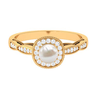 Two and a quarter carat freshwater pearl and diamond engagement ring from Rosec Jewels, showcasing elegant design and sparkling accents.