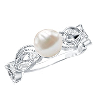 Rosec Jewels 2 Carat freshwater pearl vintage engagement ring with diamond, featuring intricate metalwork and elegant design.