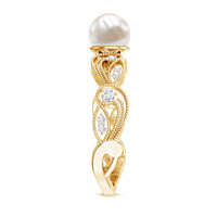 Vintage-style freshwater pearl engagement ring with diamond accents by Rosec Jewels, featuring a 2-carat pearl centerpiece.