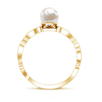 Vintage-style Rosec Jewels 2 Carat freshwater pearl engagement ring with diamond accent, featuring intricate metalwork and elegant design.