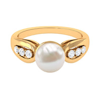 Freshwater pearl solitaire ring with diamond side stones by Rosec Jewels, showcasing a elegant ring design with a central pearl.