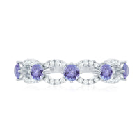 Real Tanzanite and diamond half eternity ring for women by Rosec Jewels, showcasing a band with alternating gemstones.