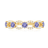 Real Tanzanite diamond half eternity ring for women by Rosec Jewels, featuring a band of sparkling Tanzanite and diamond accents.