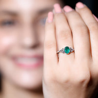 Oval Shaped Emerald Celtic Engagement Ring in Bezel Setting